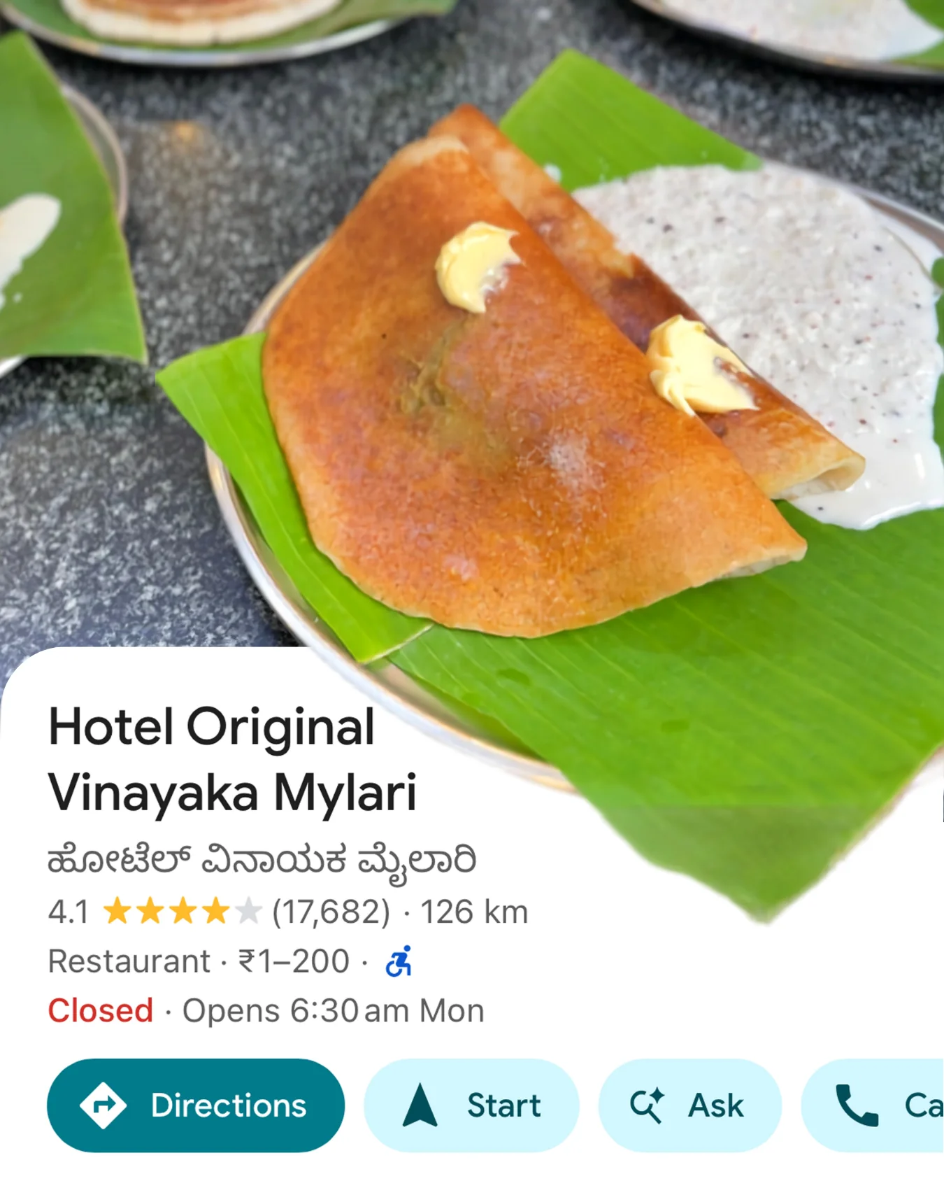 Card for Hotel Original Vinayaka Mylari in Mysuru — a butter-topped Mylari dosa on a banana leaf.