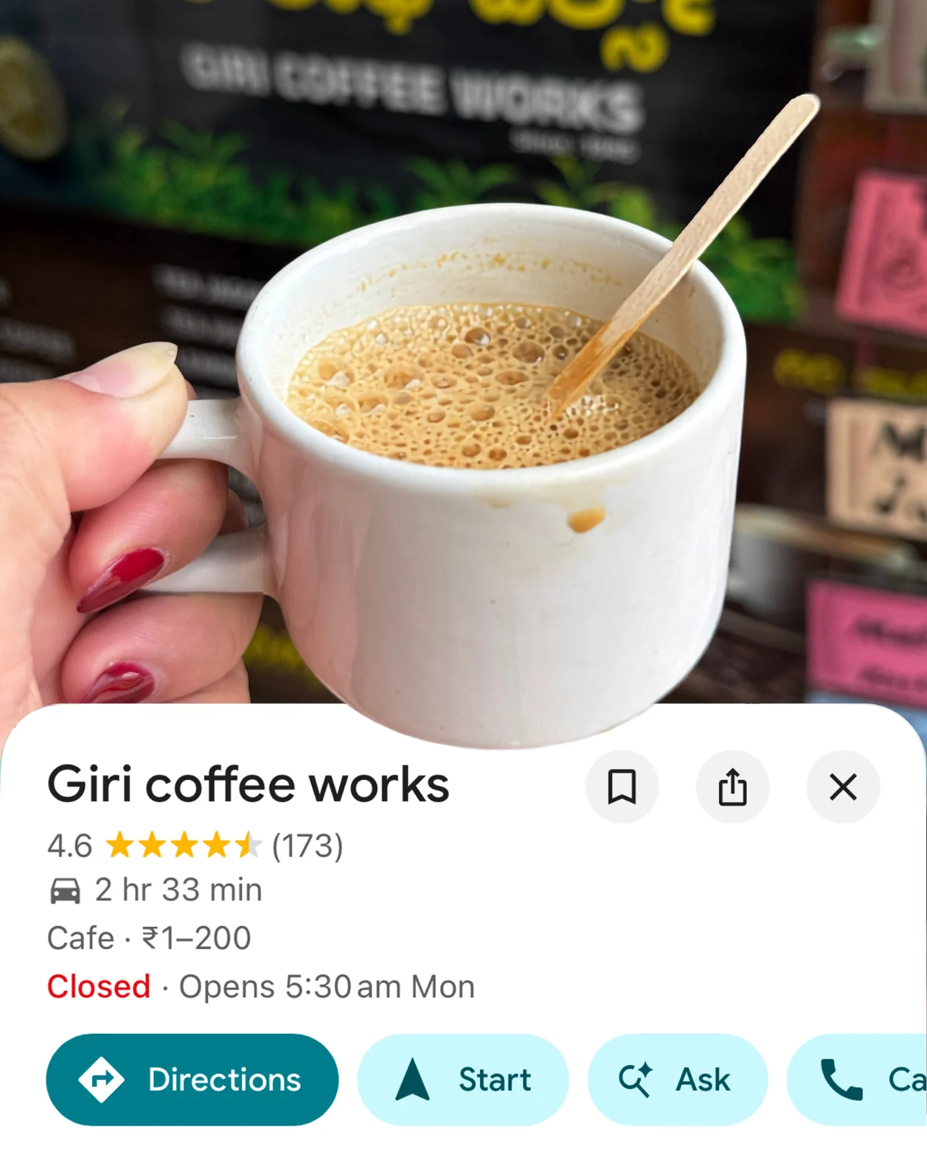 Card for Giri Coffee Works in Mysuru — a cup of South Indian filter coffee held in one hand.