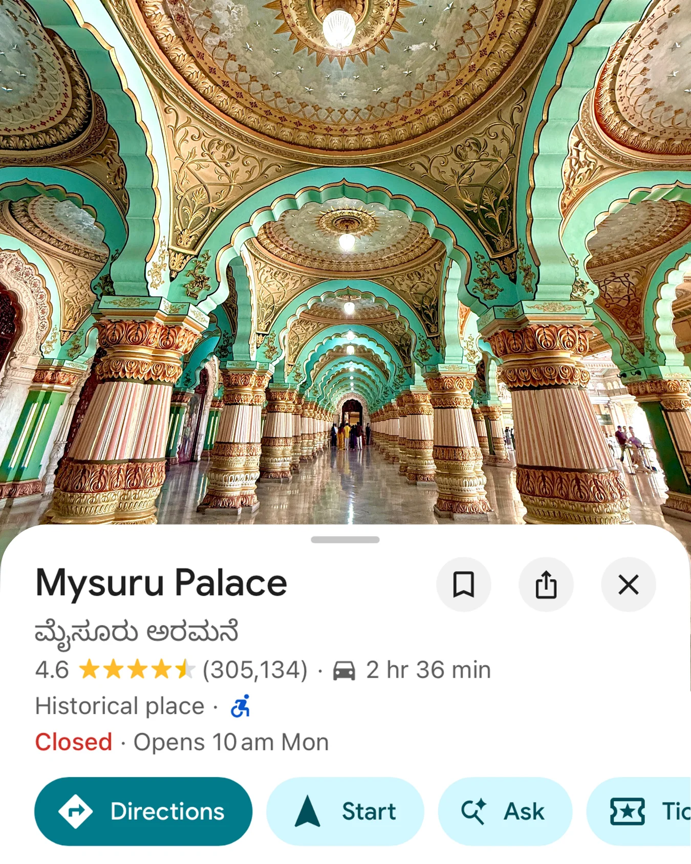 The painted interior arches and columns of Mysuru Palace.