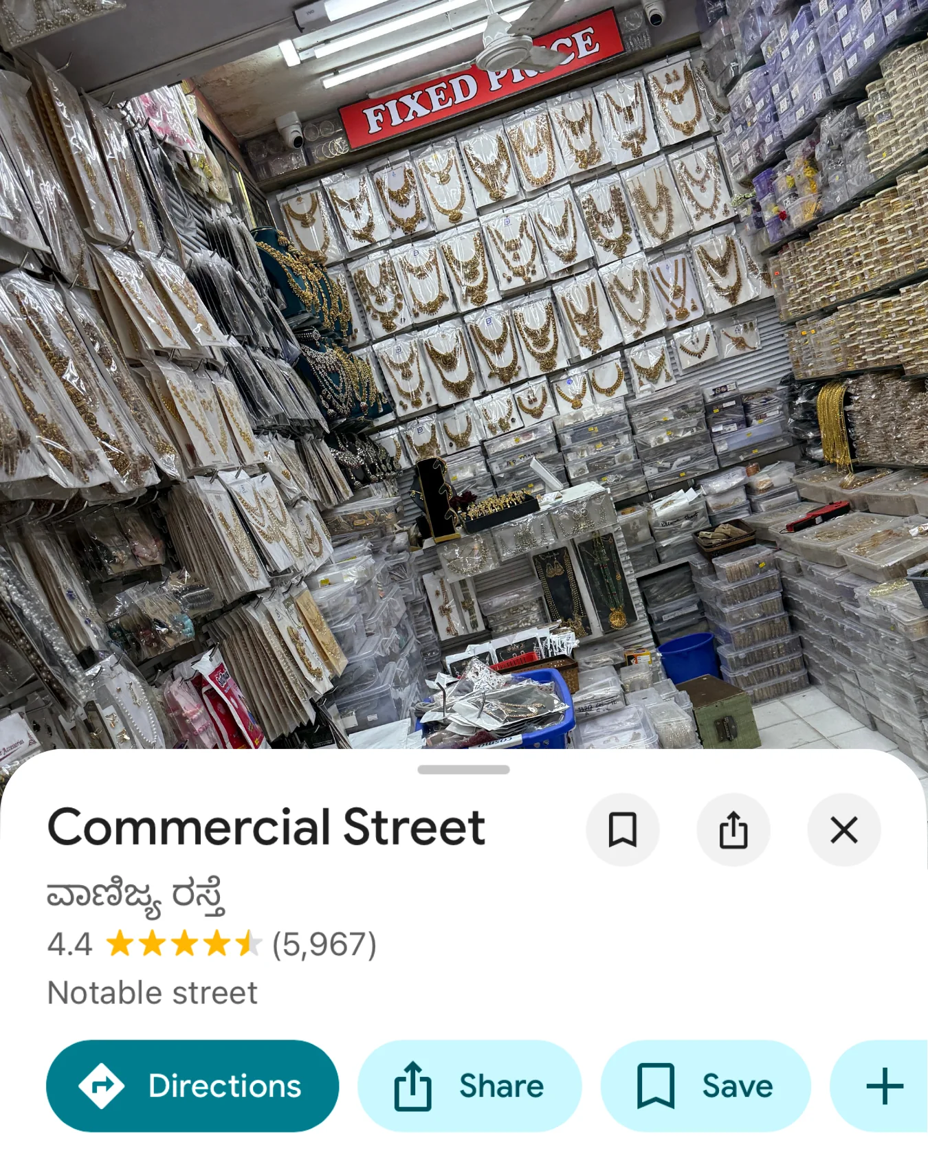 Card for Commercial Street, Bengaluru — a jewellery stall walled with bangles and jhumkas.